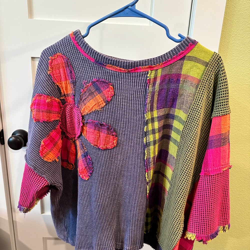 Colorful Patchwork Sweater with Flower Design
